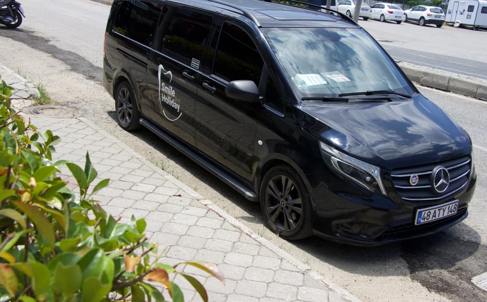 Smile & Holiday branded Mercedes Vito airport transfer vehicle